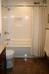 Custom Tile Showers - Tile St. Louis - Travertine Tile Custom Shower Inset Shelf - Bathroom Remodel